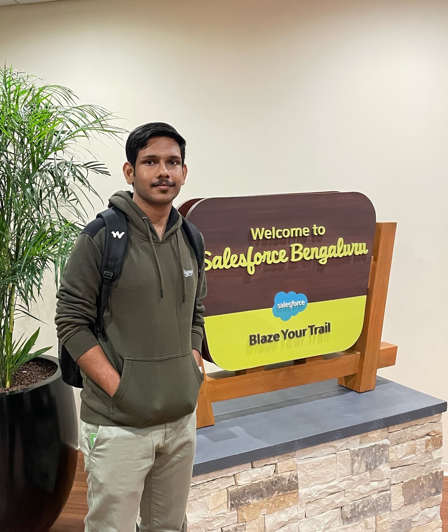 Rajasekar M standing at the Salesforce Bengaluru office