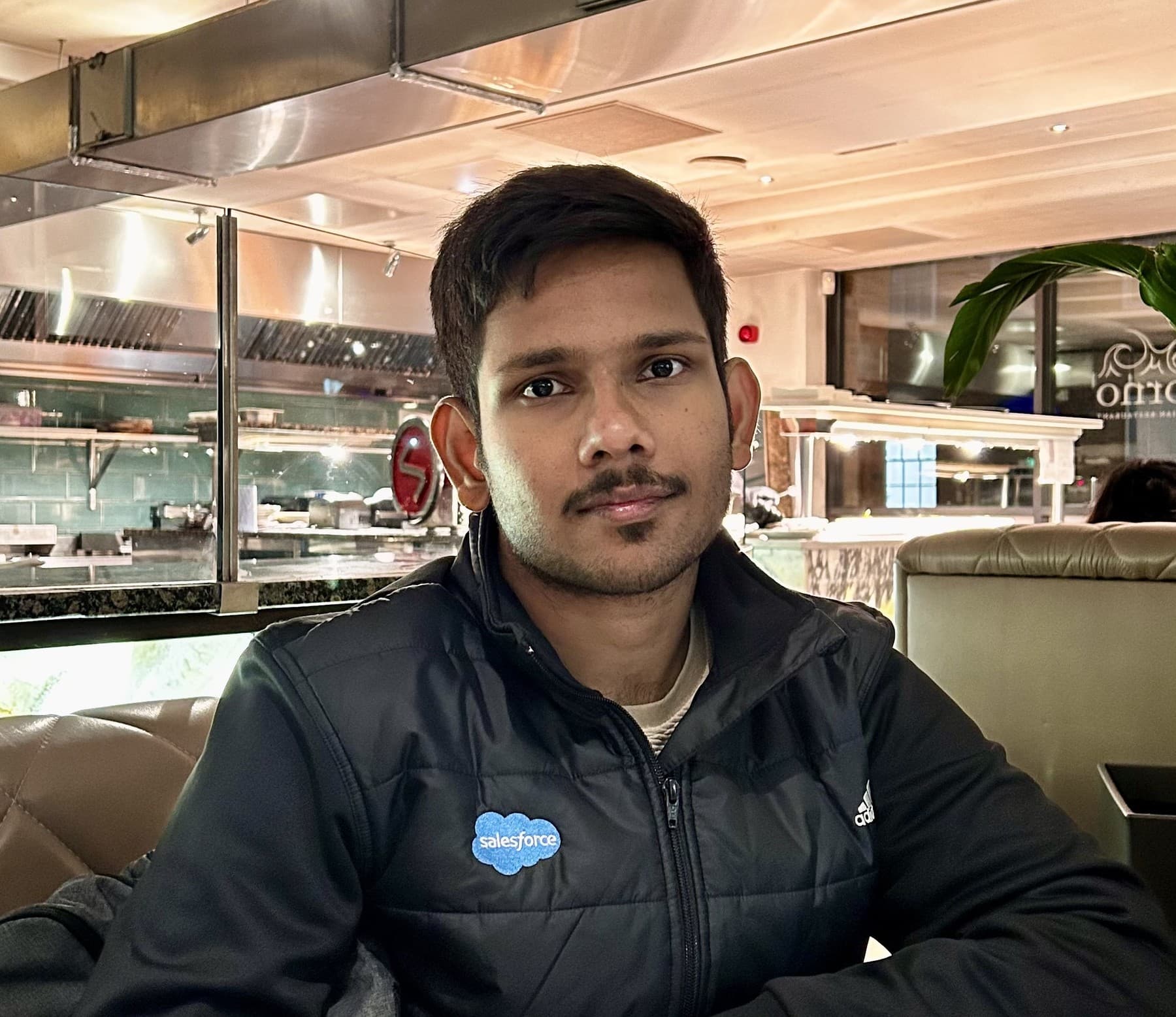 Rajasekar M wearing a Salesforce badge
